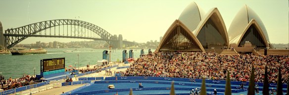 Competitors arrive at the finish the Mens Triathlon. 