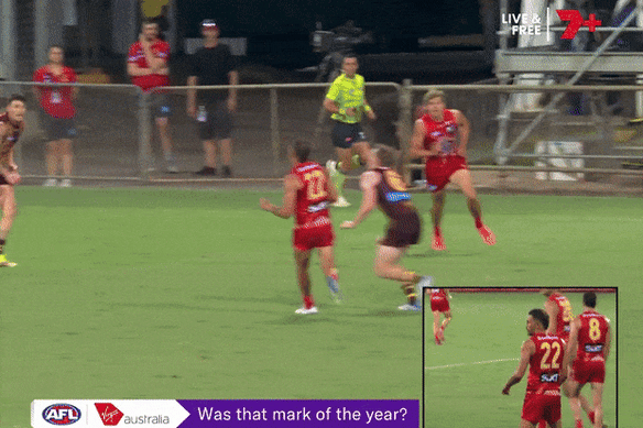 Gold Coast’s Ben Long takes a Mark of the Year contender against Hawthorn.
