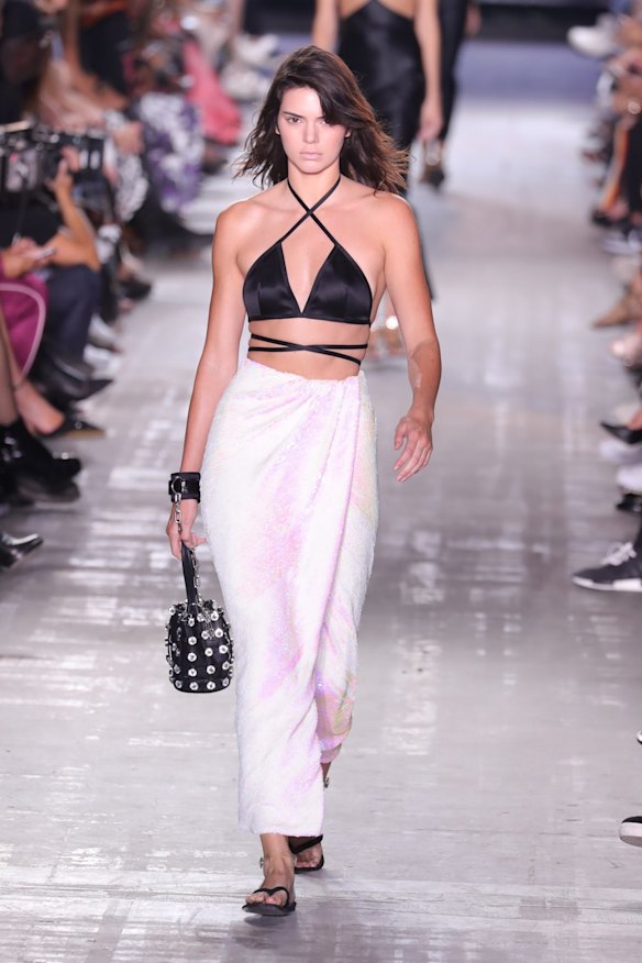 Kendall Jenner showcasing what everyone will be wearing at Potato Head come New Year's Eve at the Alexander Wang show.