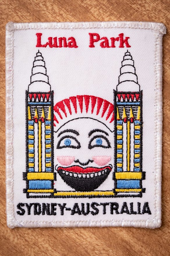 "A 1970's patch from early before the towers fell down. Looks like the same face on the number 5," says Nicole Brett with her Luna Park collection at her Brisbane home. Photo: Paul Harris