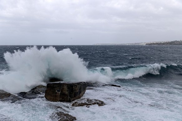 Large waves hit Bondi beach as swell builds with a southerly change.