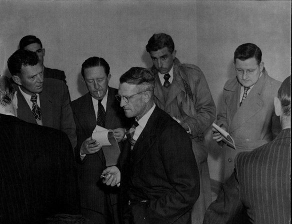 Fleming interviewed by reporters after verdict. September 6, 1951. 