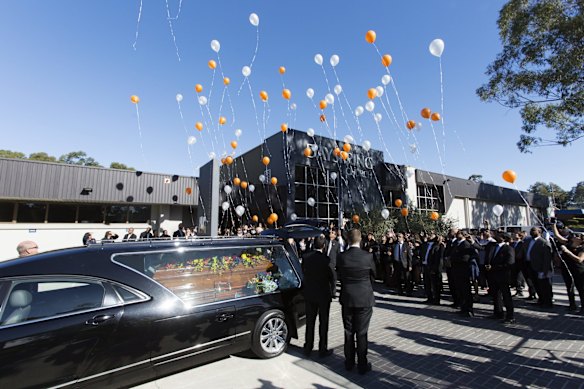 Balloons are released at the end of the funeral of Myuran Sukumaran.