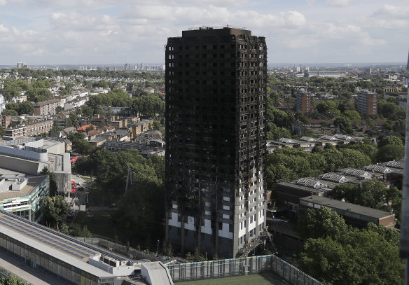 The scorched facade of the Grenfell Tower in London after a massive fire raced through it  last June.