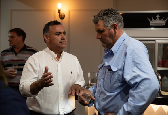 Deputy Premier John Barilaro discusses coal mining with Doug Robertson (right), a farmer and president of the Friends of the Upper Hunter group.