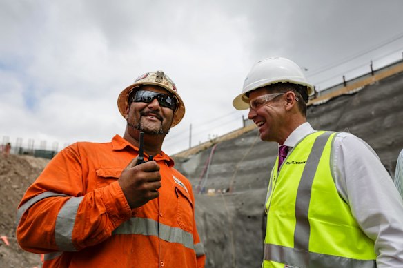 Construction worker Quinn Unahi and N.S.W Premier Mike Baird at the breaking ground ceremony of the West Connex new M5 Tunnel,