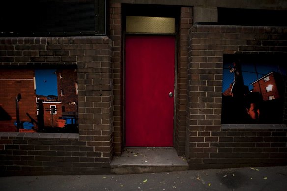 A group of Sydney based photographers have set up an impromptu photography exhibition along the walls of buildings on Elizabeth Street.