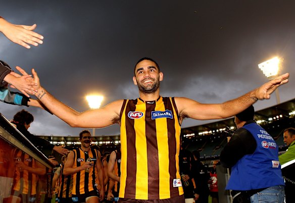 2010 Shaun Burgoyne of the Hawks leads the team off the ground after their win over Port Adelaide.
