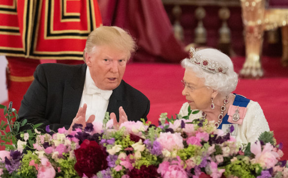 President Donald Trump and Queen Elizabeth II attend a State Banquet at Buckingham Palace in 2019.