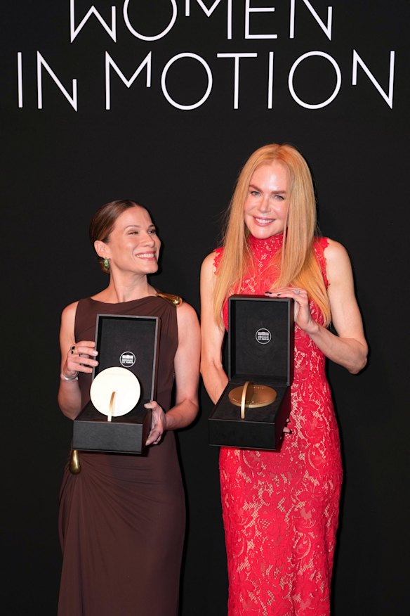 Brazilian filmmaker Marianna Brennand (left) with the 2025 Women in Motion Emerging Talent award in Cannes. Kidman won the Women in Motion award.