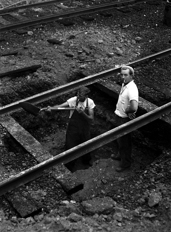 Tram tracks are removed on the Sydney Harbour Bridge on 30 June 1958.