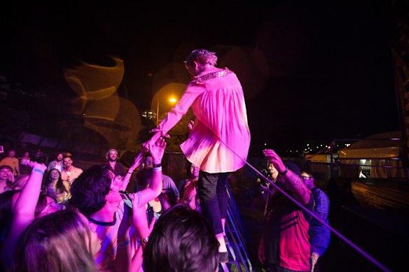 Pond play the closing set on the Spinning Top Stage.