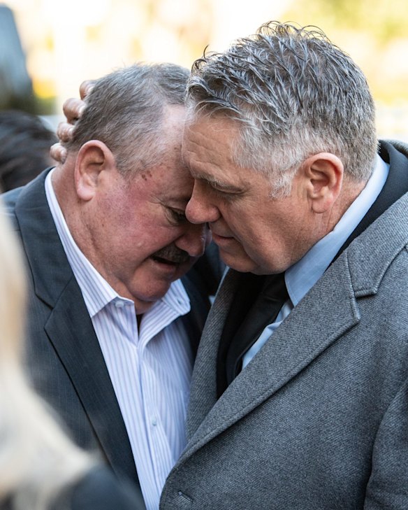 Darryl Brohman and Ray Hadley embrace before the State Funeral for rugby league immortal Robert 'Bob' Fulton.