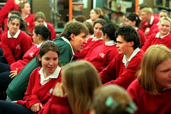Jim Stynes talks to Peter Grantham during his motivational session at Werribee Secondary College, September 8 1998.