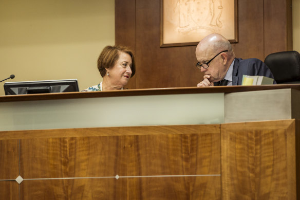 Deputy Chief Magistrate Jelena Popovic with journalist John Silvester on the bench.