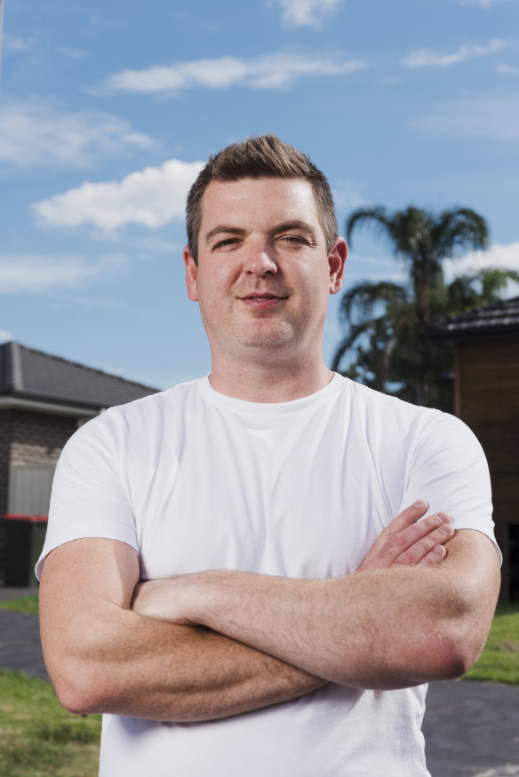 Investor Nathan Birch outside two of his properties in the Sydney suburb of Kellyville Ridge. 