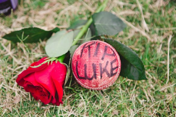 Flowers and cards left in memory of Luke Batty at Tyabb oval.