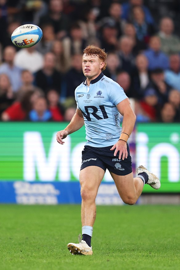 Tane Edmed in action for the Waratahs. 