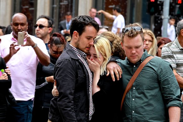 As floral tributes filled Martin Place, people arrived to grieve the lives lost in the siege. 