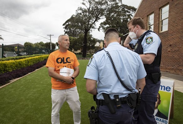 The Cumberland Mayor Steve Christou gives a statement to the police after he was assaulted by a Labour volunteer at Merrylands Public School, during local council elections.