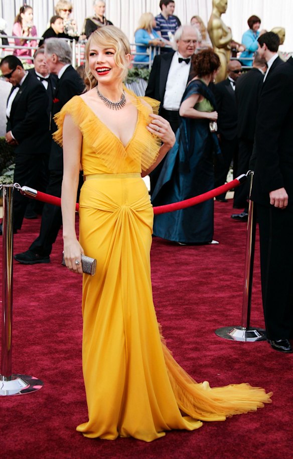 michelle williams saffron dress