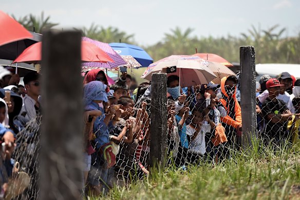 Crowds of people watch the Passion Play a re-enactment of Christs crucifixion, on Good Friday at Barangay San Pedro Cutud.