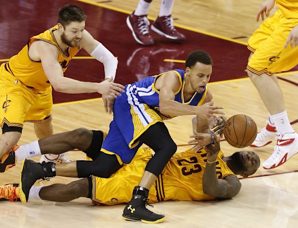 Matthew Dellavedova's game-three starring role: Steph Curry, LeBron James and Dellavedova fight for possession.