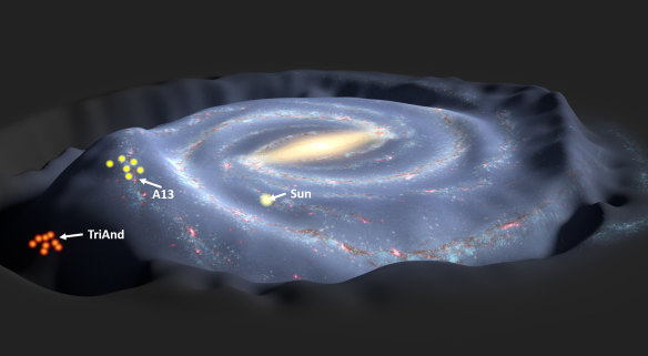 This 3D image of the Milky Way shows, on the left, the stellar ripples generated by the 'skimming' galaxy. The stars in yellow are near the ripple's peak, and the stars in red are near the trough.