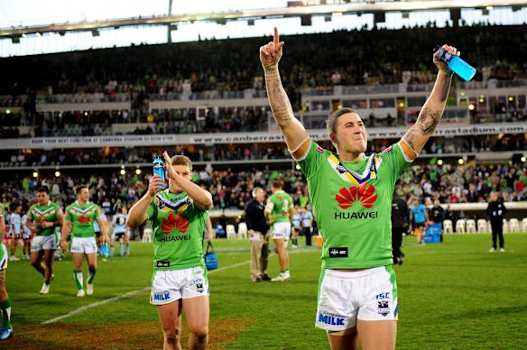 Raiders player Joel Thompson celebrates after winning the match.