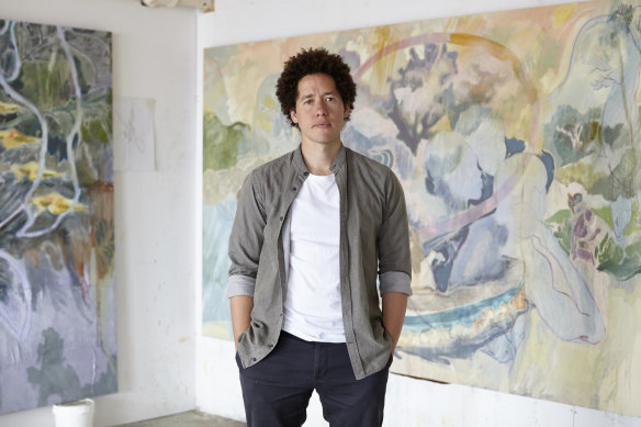 Michael Armitage in front of his painting <i>Lacuna</i>.