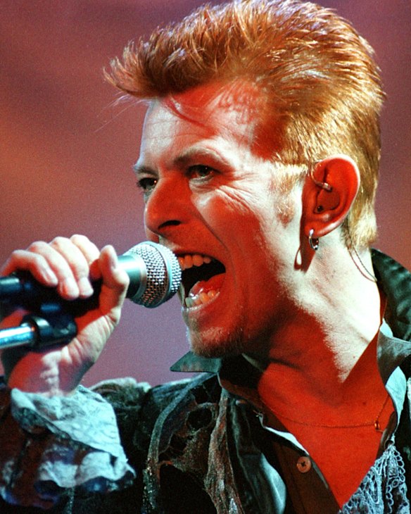 Bowie performs during the first day of the Doctor Music Festival in Spain in 1996.