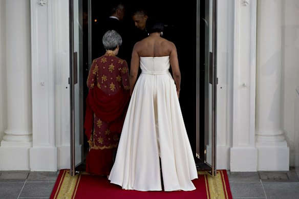 Michelle Obama and Ho Ching.