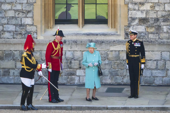 Queen Elizabeth II attends a small ceremony to mark her official birthday at Windsor Castle. 