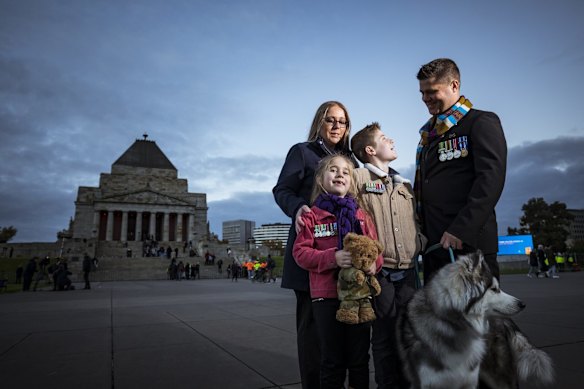 Kyal and Andrea Rode with Lily (10) and Michael (7) attend the ANZAC Day ceremony.