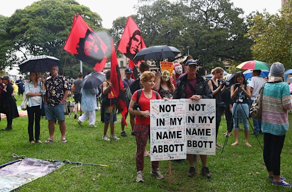 SYDNEY, AUSTRALIA - MARCH 16:  Protesters brave the wet and miserable conditions to demonstrate against the Abbott led Coalition Government on March 16, 2014 in Sydney, Australia. March In March is a nationwide grassroots protest organized to deliver a statement of no confidence in the current Australian Government.  (Photo by Don Arnold/Getty Images)