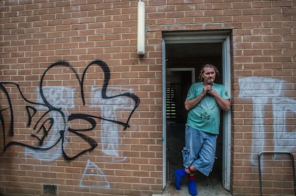 Tenders for the demolition of the Red Hill flats have been called for. Current resident Troy Osborn. 