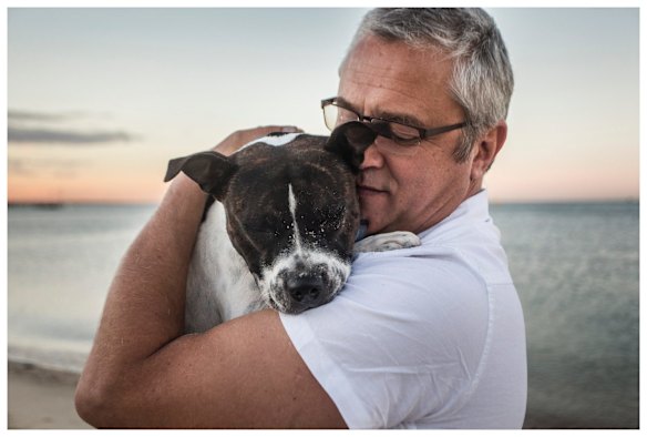 Miss Maudie and Neil McMahon have cuddles.
