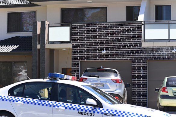 NSW Police forensic officers at the house. 