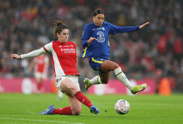 Jennifer Beattie battles for possession with Sam Kerr during the FA Cup final at Wembley Stadium.