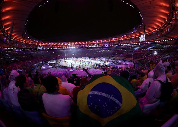Athletes parade during the 'Heroes of the Games' segment during the Closing Ceremony on Day 16 of the Rio 2016 Olympic Games.