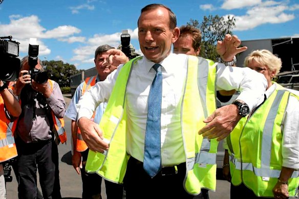 Opposition Leader Tony Abbott during a visit to a transport company in Rockhampton.
