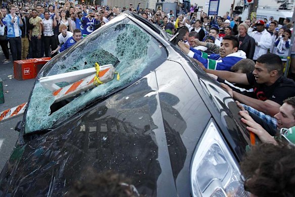 Ice hockey defeat sparks Vancouver riots