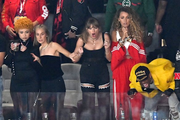 Taylor Swift (centre) wearing a corset by Australian designer Dion Lee at the Super Bowl on February 11, 2024.