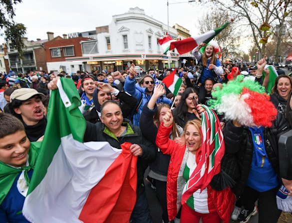 Italian soccer fans celebrate in Lygon Street, Carlton, after Italy won the Euro 2020 final against England at Wembley Stadium in London.