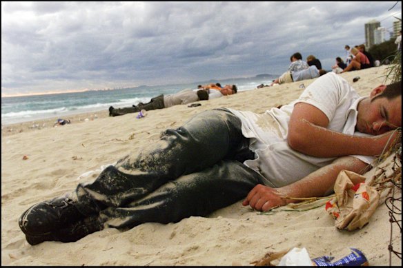 Schoolies Week in Surfers Paradise - sleeping it off on the Gold Coast beach, 1999.