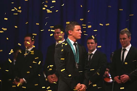 Todd Carney watches on as confetti falls after he was presented with the Dally M medal.