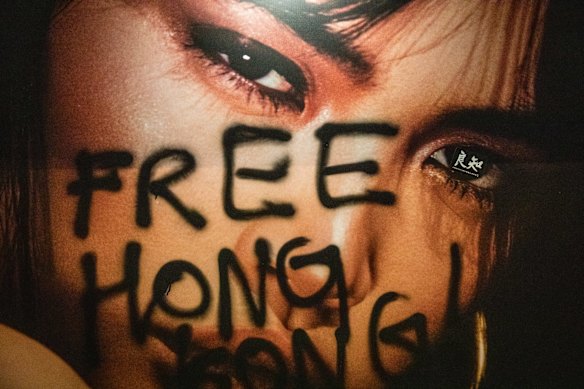 Pro-democracy posters and slogans are seen on an advertising board in the aftermath of protests on September 16, 2019 in Hong Kong, China.