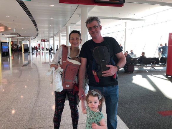 Karen Barlow and James Massola at Jakarta airport with children Sabina and twins Carlo and Giacomo.