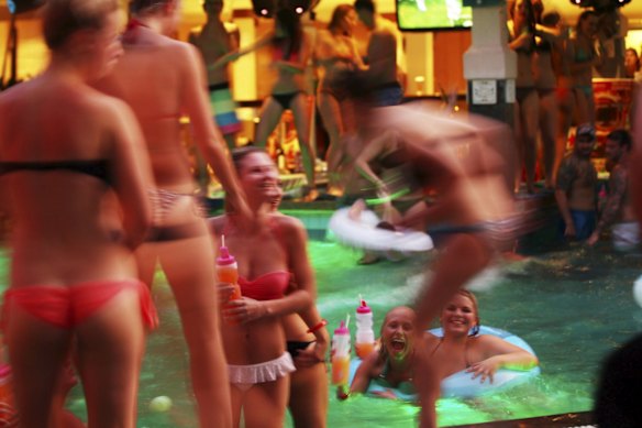 Schoolies from Engadine and Heathcote High Schools in NSW, Australia live it up at the Bounty Hotel, Kuta, 2012.