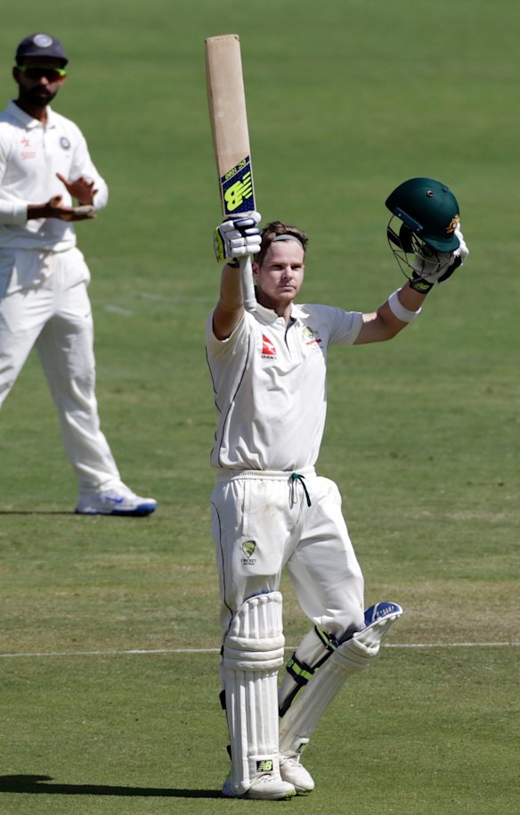 Steve Smith celebrates his century.